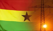 Energy Concept Ghana Flag with sunset power pole
