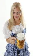 Bavarian Girl Cheers With A Beer