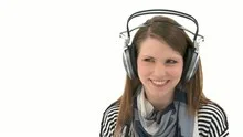 Beautiful woman listening to music with headphones