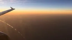 Aerial Sunset Above Clouds