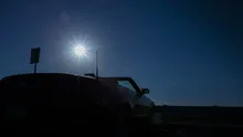 4K Time lapse pan shot convertible sun rising