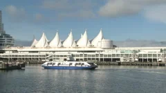 Boat Passing Canada Place In Vancouver