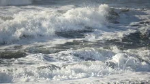 Slowmotion ocean waves breaking
