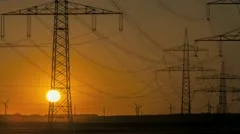 Sunset Wind Turbine And Power Lines