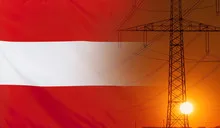 Energy Concept Austria Flag with sunset power pole