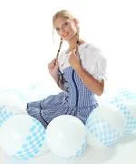 Bavarian Girl Smiling In A Set Of Balloons