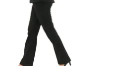 Businesswoman walking by close up legs