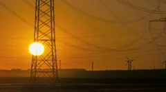 Sunset Wind Turbine And Power Lines