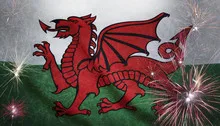 Wales Flag Firework Grunge Concept real fabric