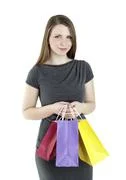 Portrait Of Young Happy Smiling Woman With Shopping Bags