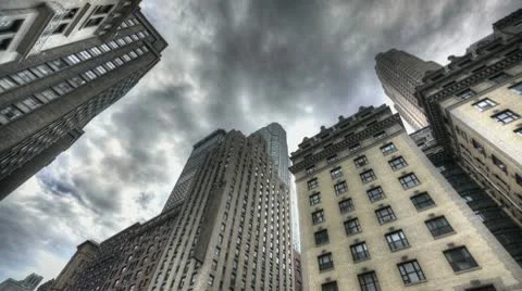 Hdr Timelapse Dark Clouds Above Skyscraper