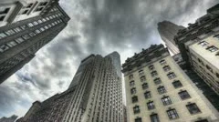 Hdr Timelapse Dark Clouds Above Skyscraper