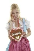 Woman Bites In A Gingerbread Heart