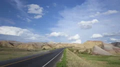 4K Time Lapse Zoom Out Badlands Colorful Yellow Mounds