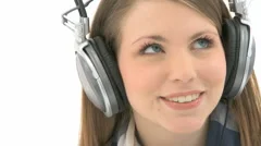 Woman Enjoys Music On Her Earphones