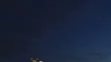 Time lapse close up tilt shot up Boston skyline at twilight