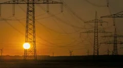 Sunset Wind Turbine And Power Lines