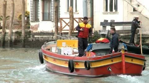 Postman On A Boat In Venice