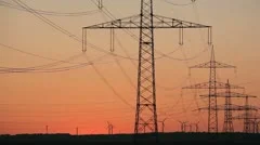 Sunset Wind Turbine And Power Lines