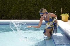 Woman At The Swimmingpool