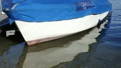 Boat With Water Reflection