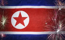 North Korea Flag Firework Grunge Concept real fabric
