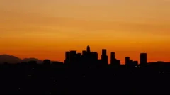 4K Time Lapse Tilt Shot Up Los Angeles Skyline Sunrise
