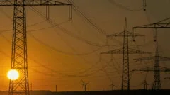 Sunset Wind Turbine And Power Lines
