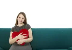Woman  With A Heart Pillow