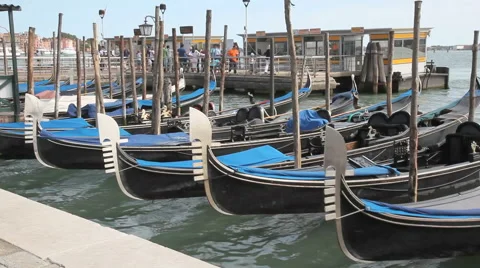 Scenery With Gondolas In Venice