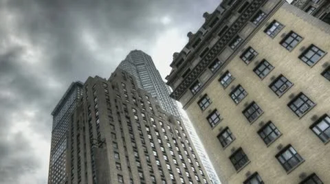 Hdr Timelapse Dark Clouds Above Skyscraper