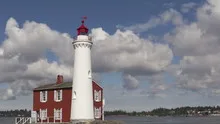 Time lapse lighthouse close up zoom out