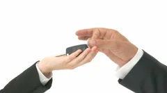 Close Up Two Hands Give And Take Of Car Key