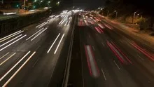 4K Time lapse rotate freeway light trails at night
