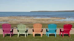 4K Time Lapse Zoom Out Shadow Over Colored Chairs At Lake