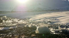 Snowdrift Through Small Icebergs With Strong Wind