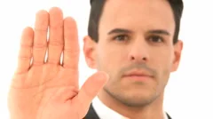 Man Shows Stop Sign With Hand