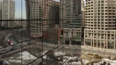 4K Time Lapse Close Up Of Traffic On Office Building Reflection