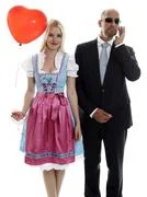 Woman In Dirndl With Bodyguard