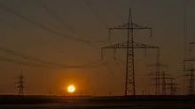 Sunset Wind Turbine and Power Lines